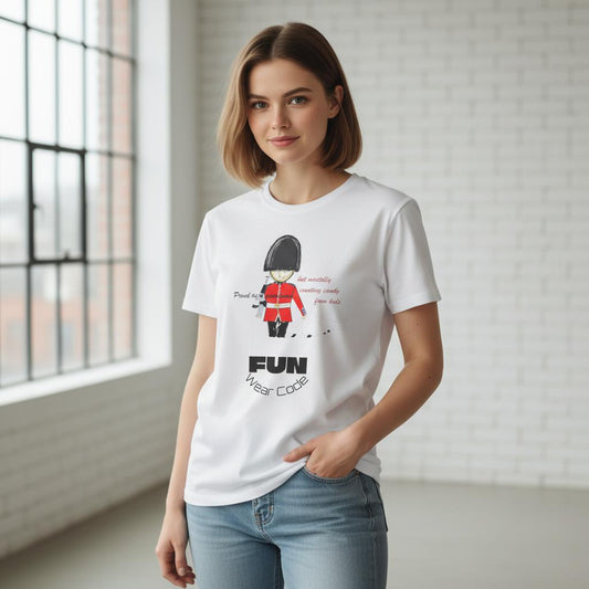 Woman wearing a white t-shirt with a royal guardsman graphic design in a bright room.