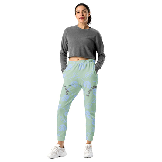 Woman wearing a gray crop top and light green pants with blue patterns and 'Fun Wear Code' text logo on a white background