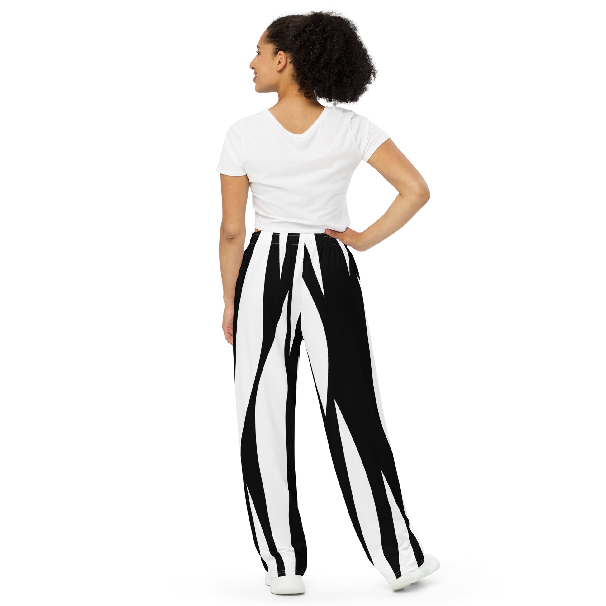 Woman wearing a white top and black and white striped pants with a 'Fun Wear Code' text logo on a white background