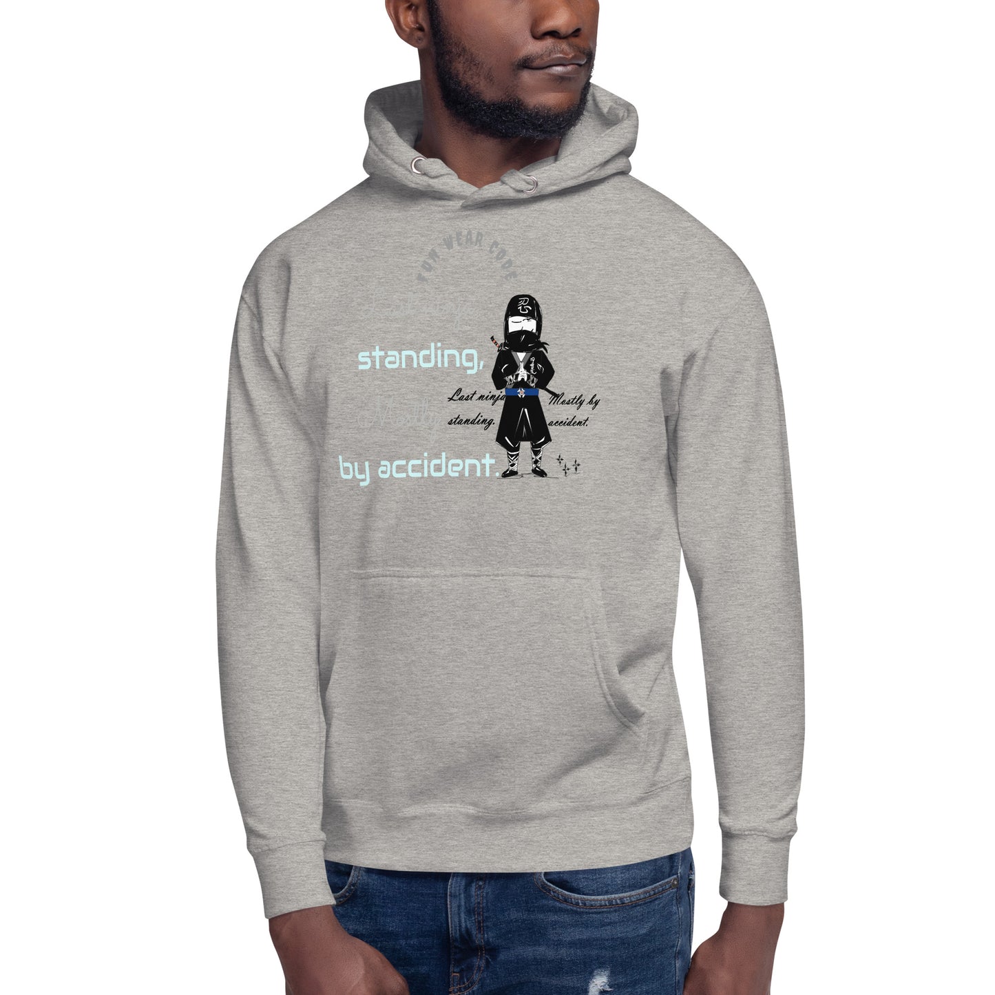 Person wearing a gray hoodie with a graphic design and text on a white background