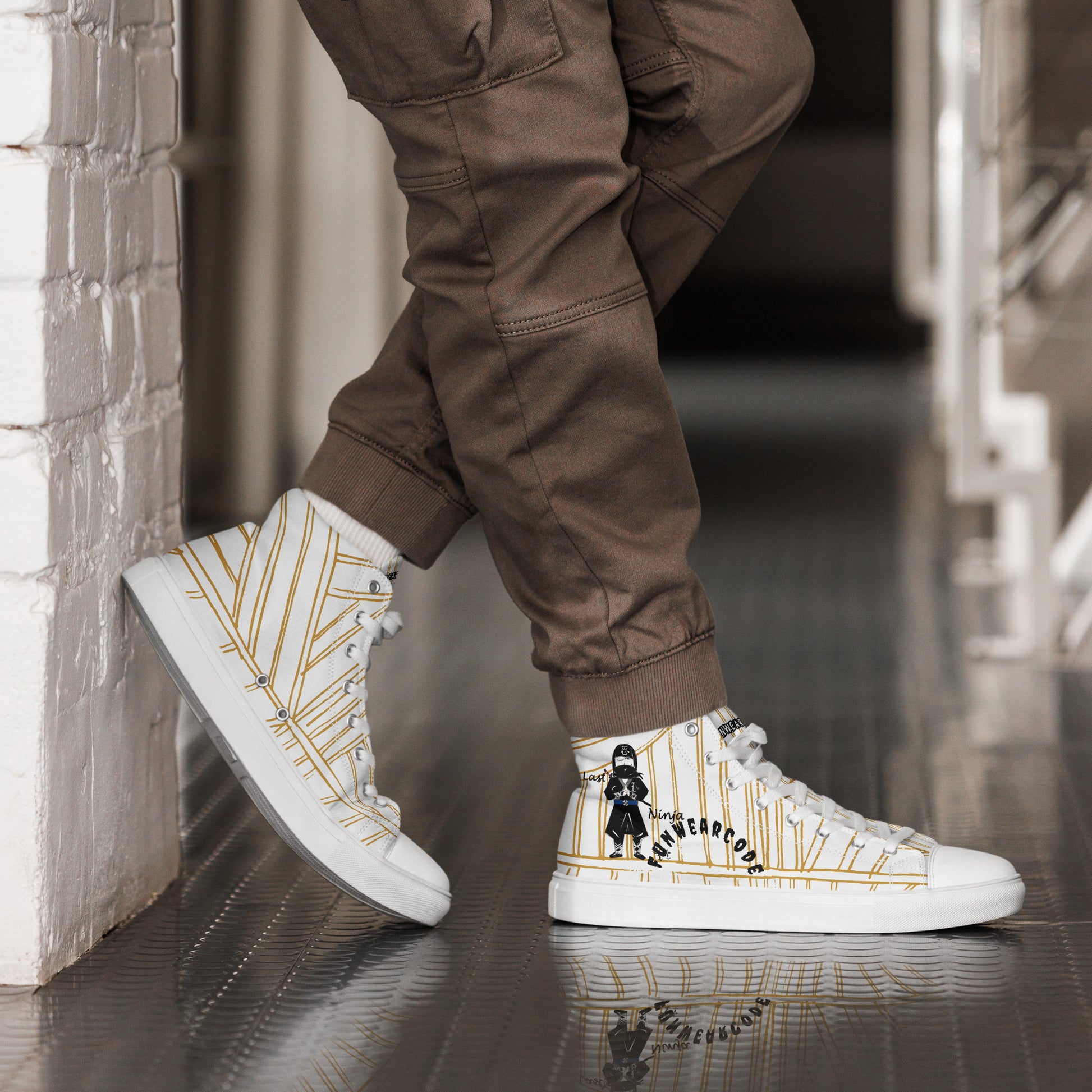 White high-top sneakers with a ninja graphic and 'Fun Wear Code' text logo worn by a person in brown pants.