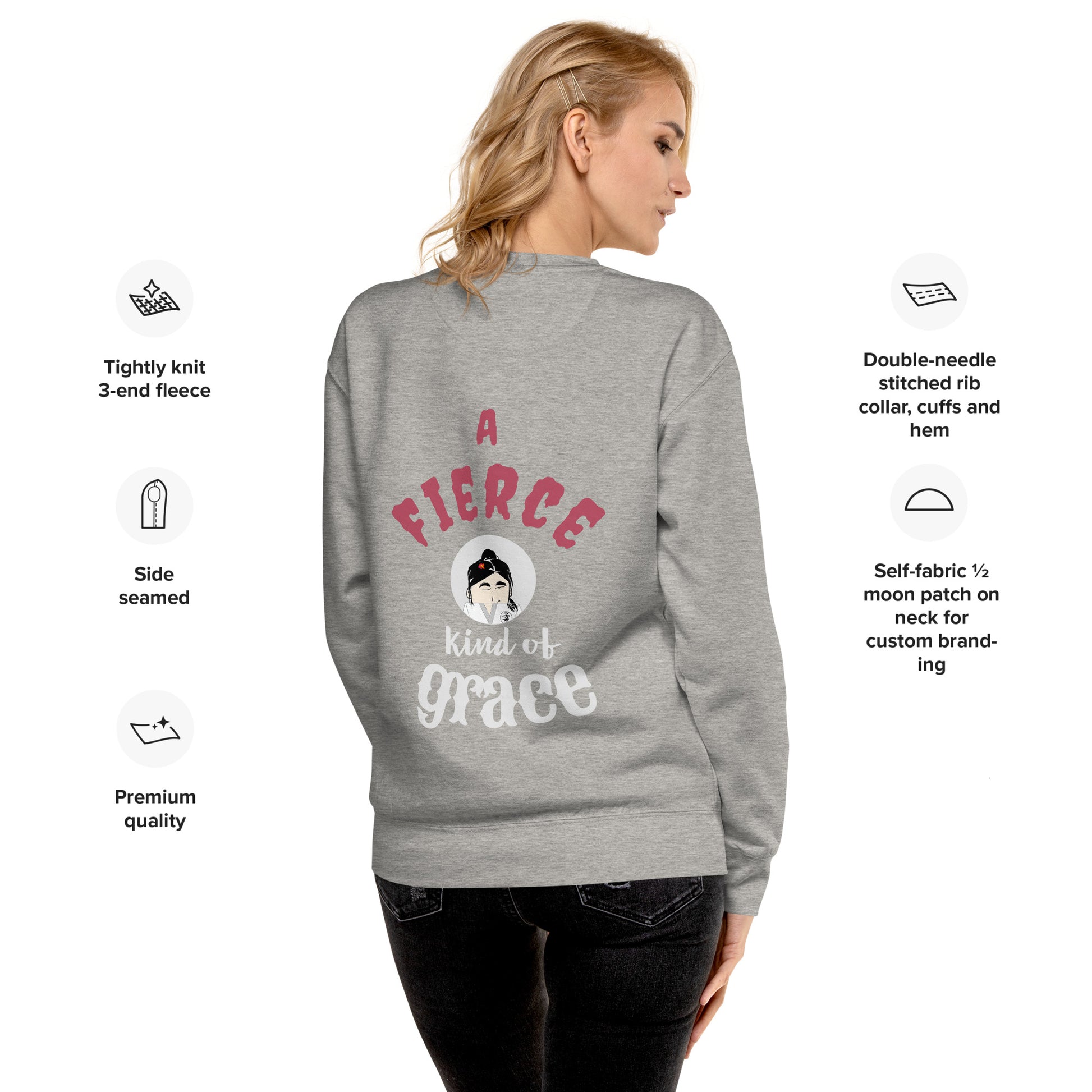 Woman wearing a gray 'Fun Wear Code' brand sweatshirt with text and judo woman graphics on the back, on a white background.