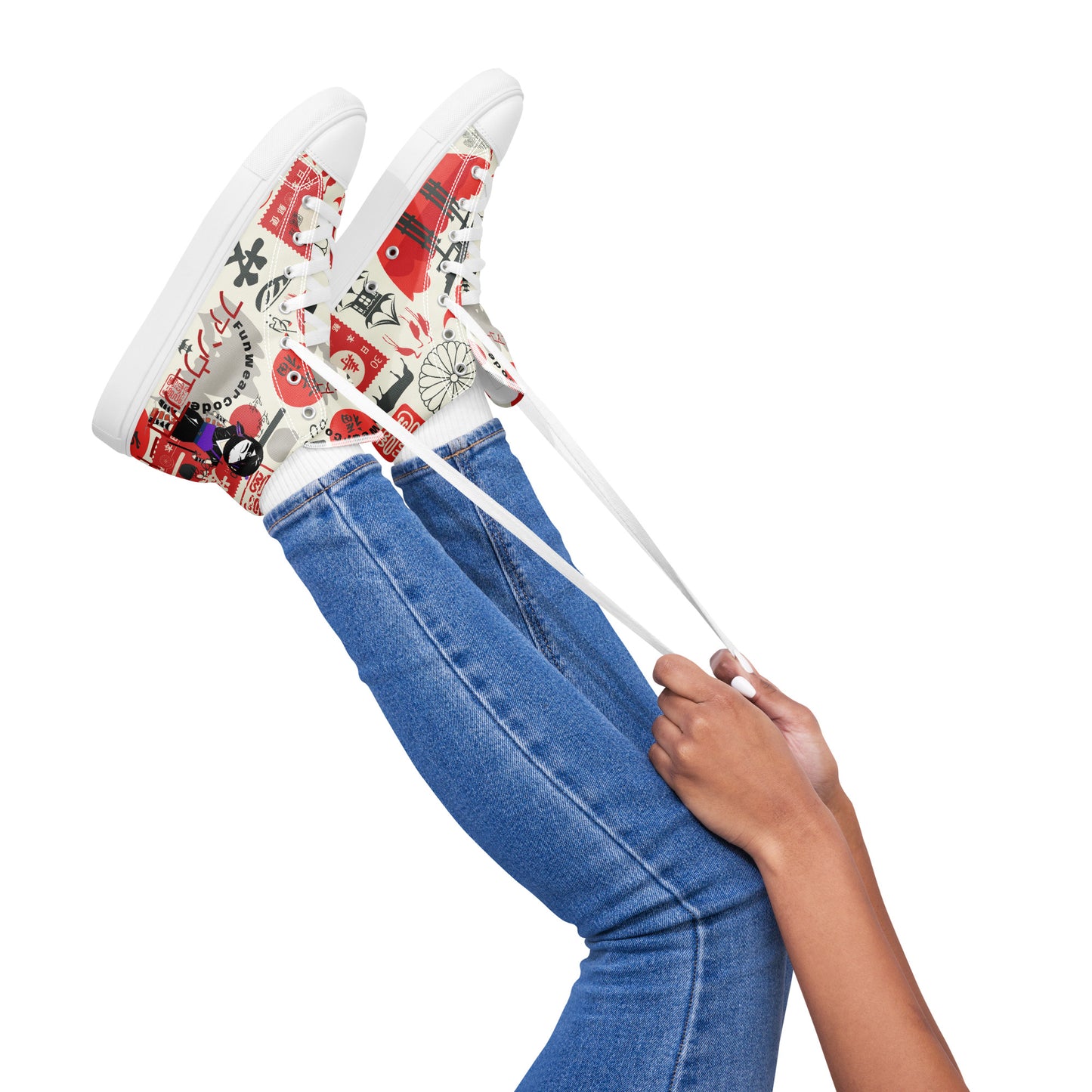 High-top sneakers with colorful Japanese-themed graphic design, and with a ninja graphic and 'Fun Wear Code' text logo worn by a person in blue jeans on a white background